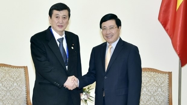 APPF-26 : le vice-PM Pham Binh Minh recoit une delegation japonaise hinh anh 1