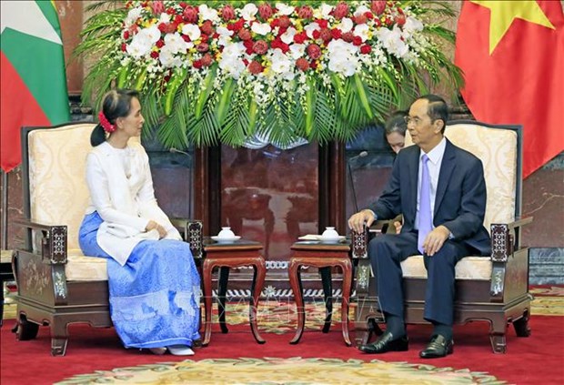 Le president Tran Dai Quang recoit la conseillere d'Etat du Myanmar hinh anh 1