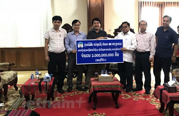 Hoang Anh Gia Lai continue d’aider les Laotiens apres l'effondrement du barrage de Xepian-Xe Namnoy hinh anh 1