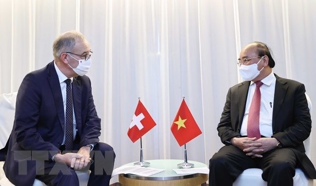 Opportunites de la visite officielle du president Nguyen Xuan Phuc en Suisse hinh anh 1
