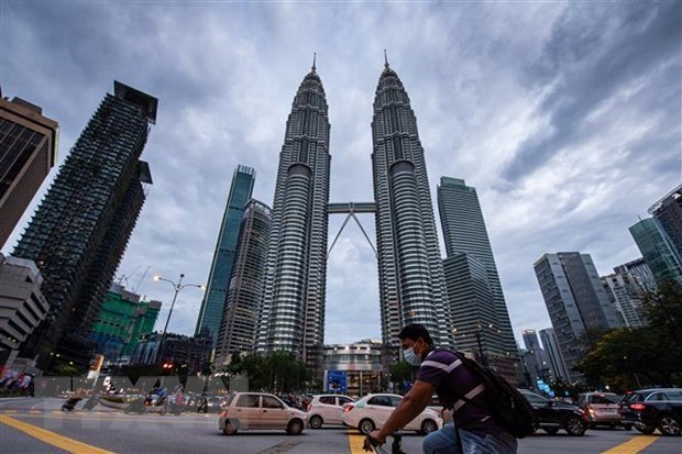 L'economie malaisienne devrait croitre a un rythme plus lent en 2022 hinh anh 1