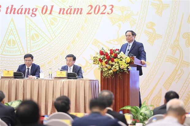Le PM Pham Minh Chinh a la conference-bilan de 2022 du secteur des Transports hinh anh 1