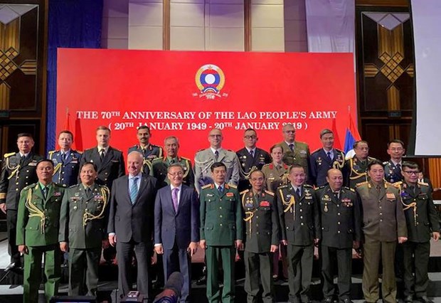 Ceremonie de celebration des 70 ans de la fondation de l’Armee populaire du Laos hinh anh 1