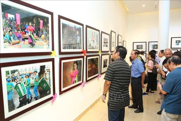 Ouverture de l’exposition photographique « La beaute des Hanoiens » hinh anh 1