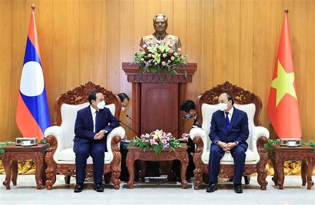 Activites du president vietnamien Nguyen Xuan Phuc au Laos hinh anh 1