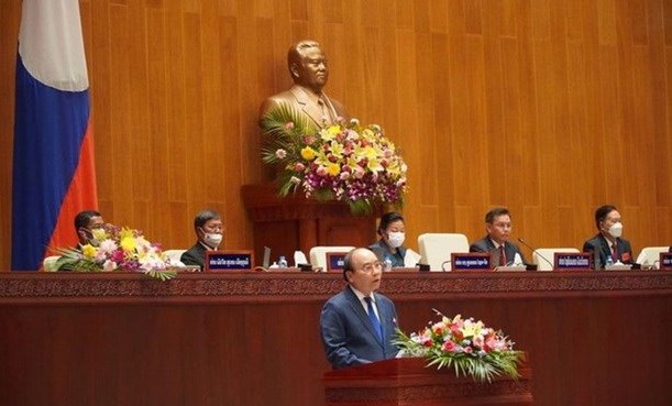 Activites du president vietnamien Nguyen Xuan Phuc au Laos hinh anh 3