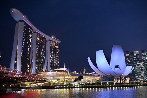 L'economie de Singapour croit plus vite que prevu hinh anh 1