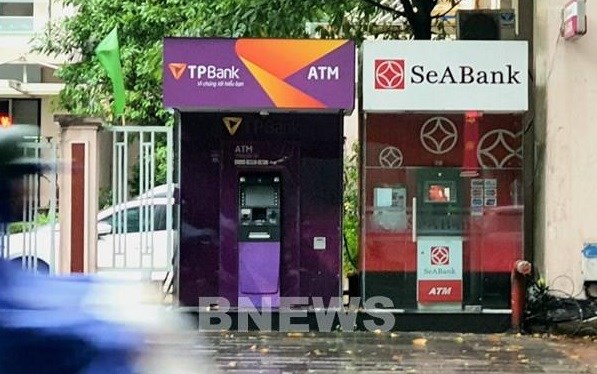 Les distributeurs automatiques de billets se vident a l'approche du Tet hinh anh 1