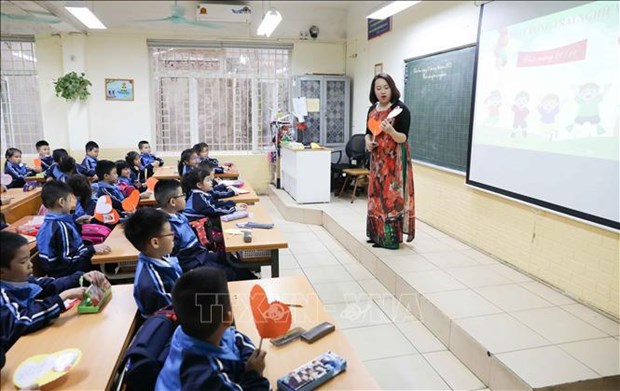 Hanoi : Retour a l'ecole des eleves elementaires des 12 arrondissements prevu le 21 fevrier hinh anh 1