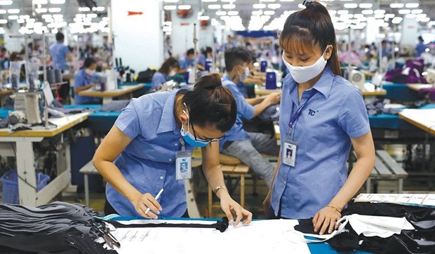 Le Vietnam cible 43 milliards de dollars d'exportations de textile-habillement en 2022 hinh anh 1