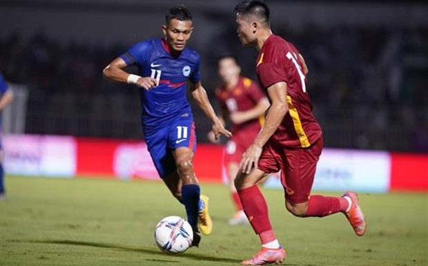 Le Vietnam s'impose 4 a 0 contre Singapour lors d'un match de football amical hinh anh 2