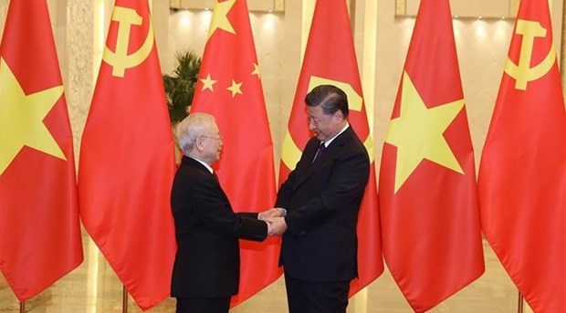 Ceremonie d’accueil officielle du leader du PCV Nguyen Phu Trong en visite officielle en Chine hinh anh 2