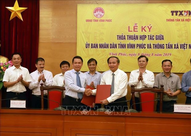Cooperation entre l’Agence vietnamienne d’Information et Vinh Phuc hinh anh 1