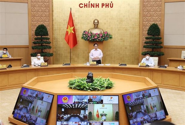 COVID-19 : le PM se reunit avec Tien Giang et Kien Giang hinh anh 1