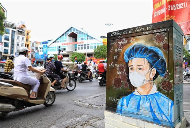 Celebration des 67 ans de la Journee de liberation de la capitale: Hanoi resiste au COVID-19 hinh anh 2