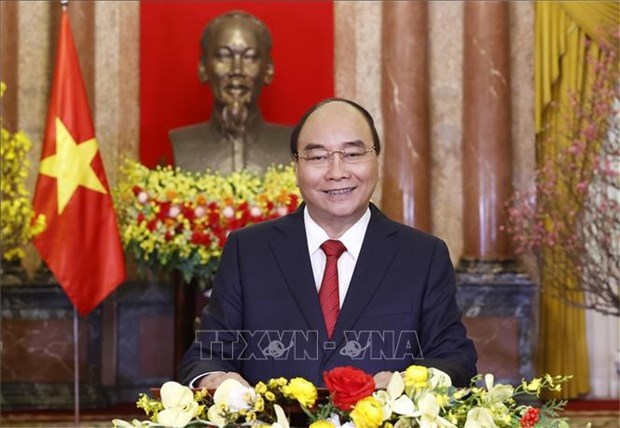 Le president Nguyen Xuan Phuc adresse ses meilleurs voeux du Nouvel An lunaire du Tigre 2022 hinh anh 1