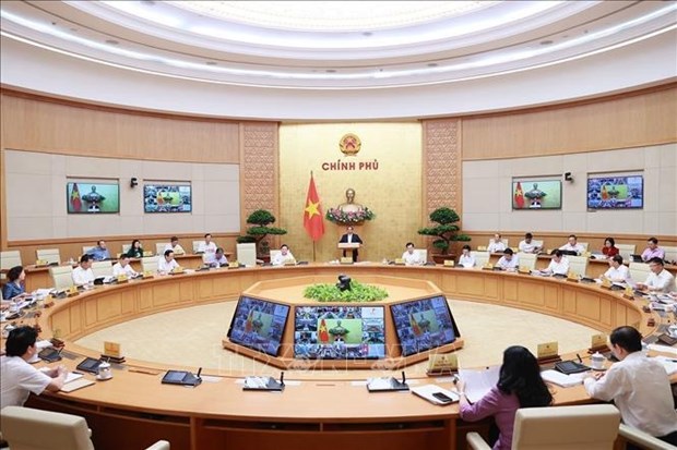 Le PM preside la reunion periodique de mai entre le gouvernement et les localites hinh anh 2