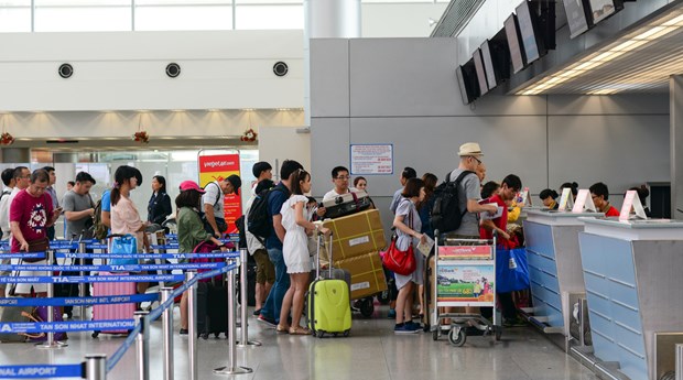 Tet 2020 : les passagers de l'aeroport Tan Son Nhat doivent arriver trois heures avant le depart hinh anh 1