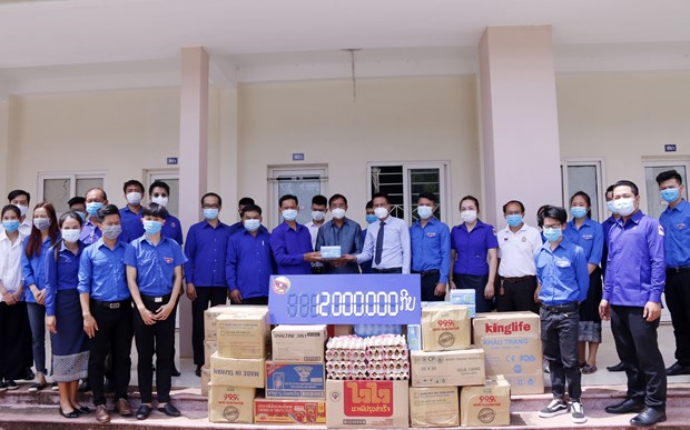 Le Laos soutient les etudiants vietnamiens dans la prevention du COVID-19 hinh anh 1