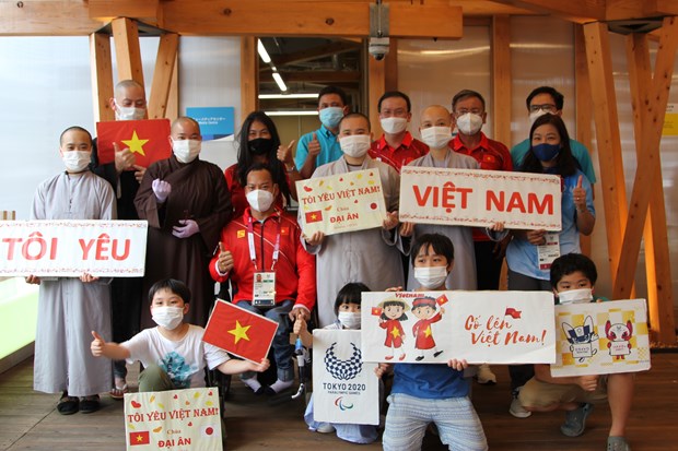 Jeux paralympiques 2020: la communaute des Vietnamiens au Japon encouragent les sportifs vietnamiens hinh anh 1