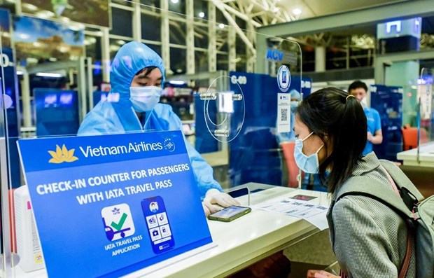 Travel Pass, un taux de vaccination anti-COVID-19 plus eleve permet au Vietnam de ... hinh anh 1