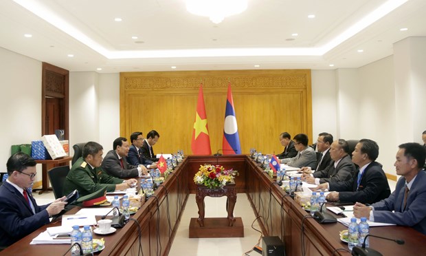 Vietnam-Laos: Promouvoir la cooperation entre les Commisions de la Defense et de la Securite de l'AN hinh anh 1