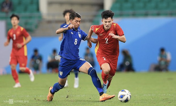 Championnat d’Asie de football d’U23: Le Vietnam fait match nul 2-2 contre la Thailande hinh anh 2