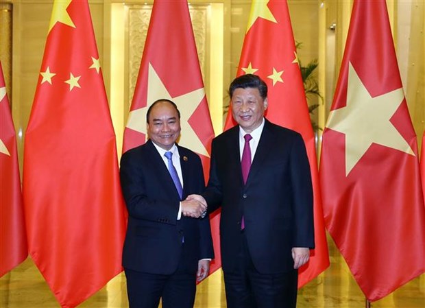 Entrevue entre le PM Nguyen Xuan Phuc et le dirigeant chinois Xi Jinping hinh anh 1