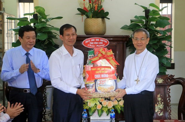 Paques: felicitations aux catholiques et protestants de Vinh Long hinh anh 1