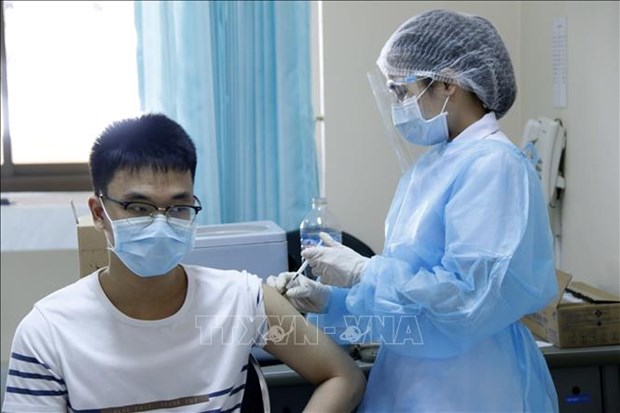 COVID-19 : le Laos commence a vacciner les jeunes de 12 a 17 ans hinh anh 1