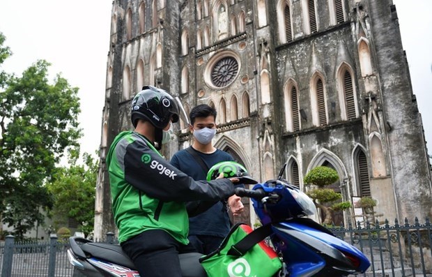 Hanoi autorise la reprise des services de motos-taxis a la demande hinh anh 1