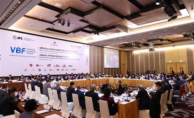 ​Le Forum d’affaires du Vietnam 2022 discute de la promotion de la relance economique nationale hinh anh 1