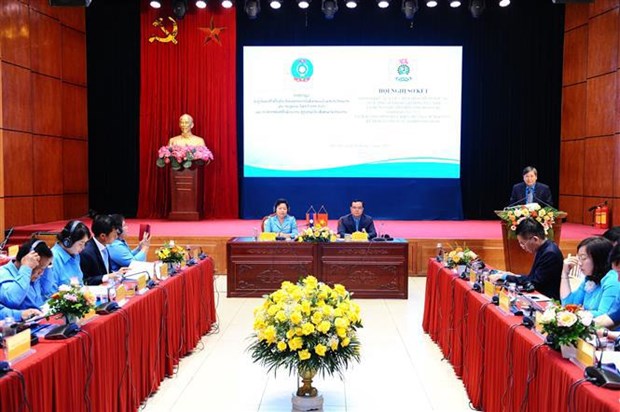 Bilan de la cooperation syndicale Vietnam-Laos pour la periode 2018-2023 hinh anh 1