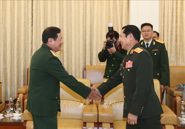 Le Vietnam et le Laos renforcent leur cooperation dans la defense hinh anh 1