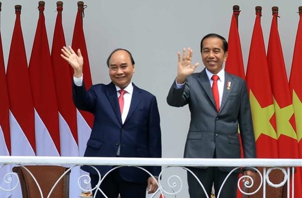 Ceremonie d’accueil officielle du president Nguyen Xuan Phuc en Indonesie hinh anh 1