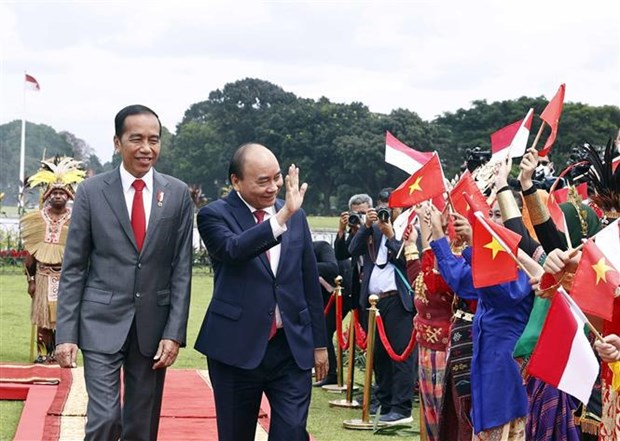 Ceremonie d’accueil officielle du president Nguyen Xuan Phuc en Indonesie hinh anh 2