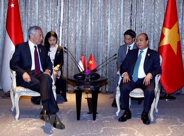 Le PM Nguyen Xuan Phuc rencontre des dirigeants en marge du 34e sommet de l'ASEAN ​ hinh anh 3