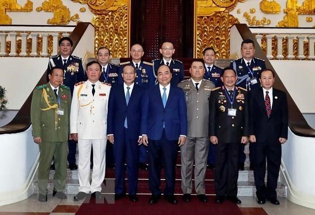Le Premier ministre recoit les chefs de delegations participant a l'ASEANAPOL 39 hinh anh 1