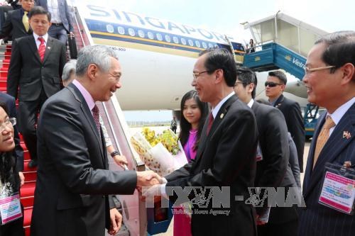 La visite du PM Lee Hsien Loong resserrera les liens Singapour-Vietnam hinh anh 1