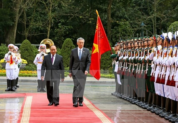 Le Premier ministre singapourien Lee Hsien Loong termine sa visite au Vietnam hinh anh 1