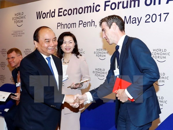 Le Premier ministre Nguyen Xuan Phuc termine ses activites au WEF-ASEAN 2017 hinh anh 1