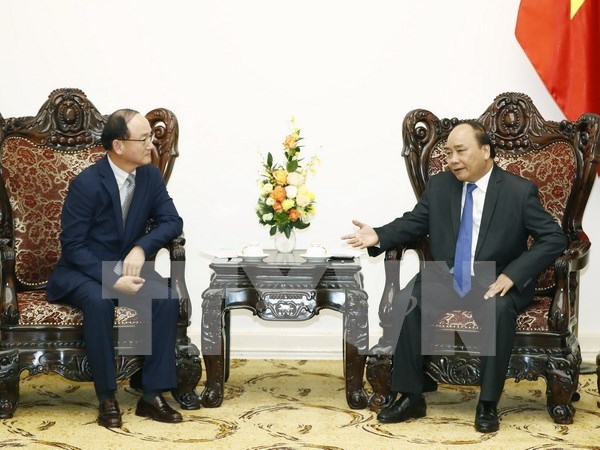 Le PM Nguyen Xuan Phuc recoit le chef de Samsung Vietnam hinh anh 1