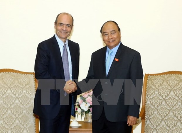 Le Premier ministre Nguyen Xuan Phuc recoit le directeur general d'AB InBev hinh anh 1