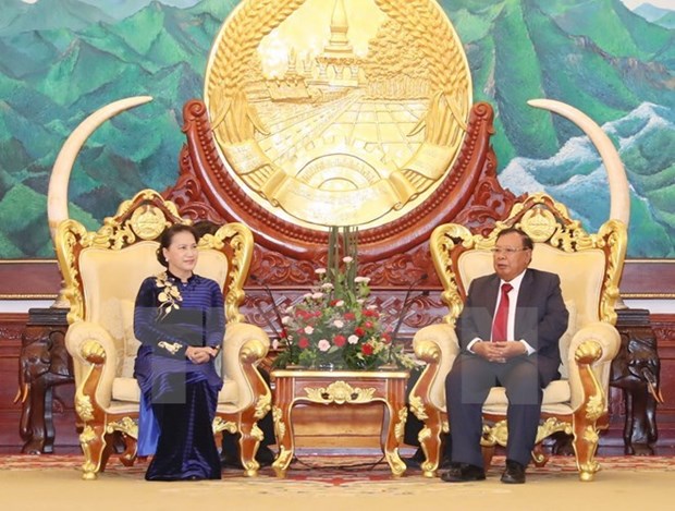 La presidente de l’AN rencontre le secretaire general du PPRL et president laotien hinh anh 1