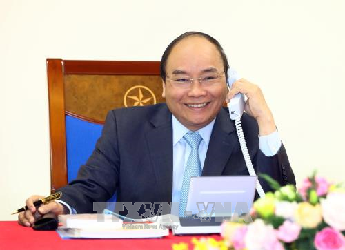 Vietnam-Japon : conversation telephonique entre les Premiers ministres hinh anh 1