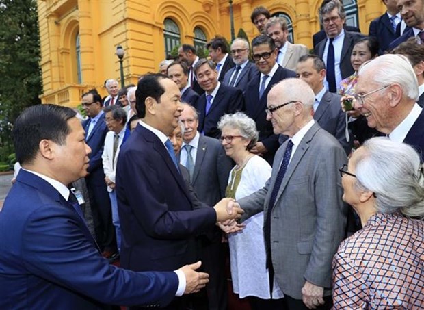 Le president Tran Dai Quang rencontre des scientifiques vietnamiens et internationaux hinh anh 1