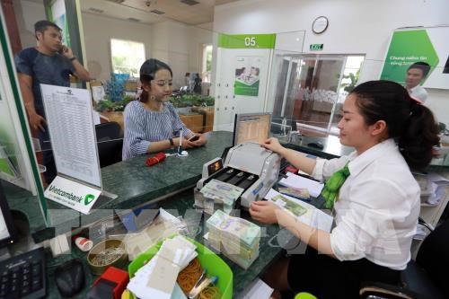 Moody’s releve les notes de 14 banques vietnamiennes hinh anh 1