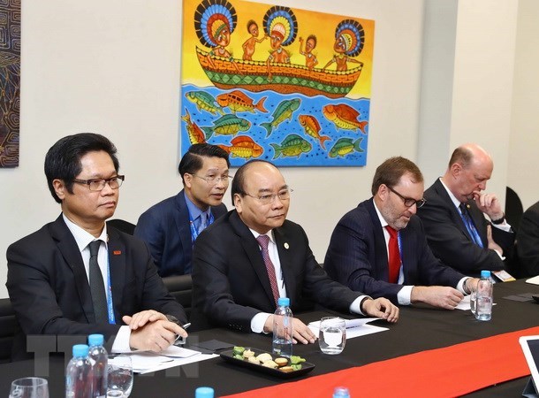 APEC 2018 : le Premier ministre rencontre des entreprises americaines hinh anh 1