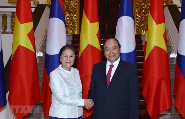 Le Premier ministre salue les relations speciales Vietnam-Laos hinh anh 1