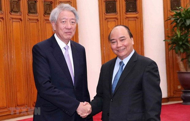 Le PM plaide pour le developpement relations entre le Vietnam et Singapour hinh anh 1